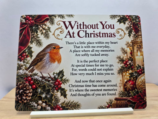 Without You At Christmas memorial metal sign with robin, red ribbons, gold lantern and poem on its white stand