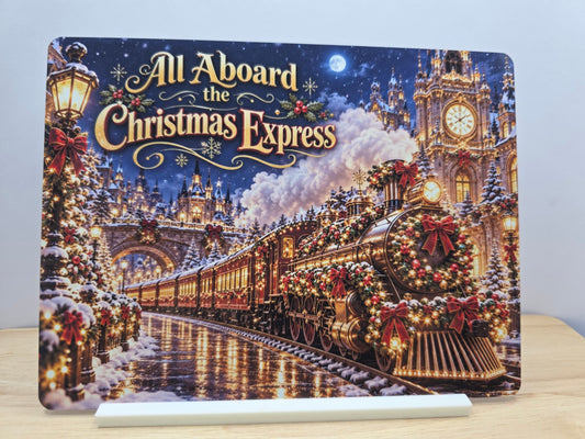 All Aboard the Christmas Express metal sign showing a festive steam train on its included stand