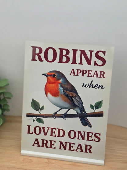 Robins Appear When Loved Ones Are Near portrait memorial metal sign with a delicate robin illustration and gentle remembrance wording.