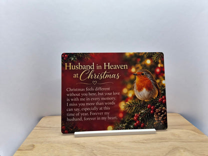 Husband in Heaven at Christmas memorial metal sign with a robin, holly and glowing festive lights, displayed in a white stand