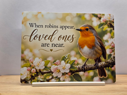 When Robins Appear Loved Ones Are Near metal sign with a robin on a blossom branch, displayed in a white stand